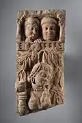 Yakshi with onlookers, dated 20 BCE.[107]