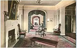 Formal standing room with oriental rug and fireplace