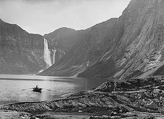 Aerial view of Ringedalsvatnet with Ringedalsfossen in the background (c. 1885)
