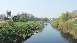 River Wharfe at Tadcaster with St Mary the Virgin Church in background, 53°53′4.24″N 1°15′38.16″W﻿ / ﻿53.8845111; -1.2606000