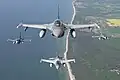 Romanian and Portuguese F-16s flying over Lithuania (May 2023)