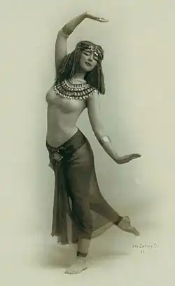 Photographed by Otto Sarony, c. 1900. St. Denis began to investigate Oriental dance after seeing an image of the Egyptian goddess Isis in a cigarette advertisement.[11]