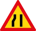 Road narrows on left side