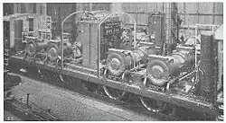 Interior view of a Swiss SBB Ae 4/6 locomotive, showing the four pairs of traction motors, directly above each axle.