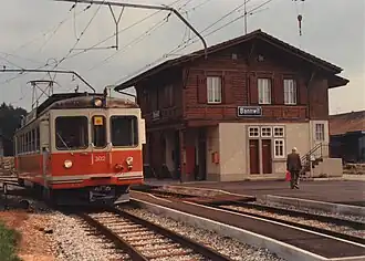 station building with upper floor in different color (undated)