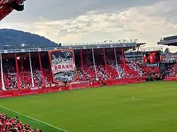 Brann supporters cheer before the start of a UEFA Champions League qualification match against FC Red Bull Salzburg in July 2025