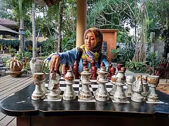 A girl playing chess in Salatiga, Indonesia