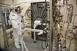 Samantha Cristoforetti attired in an Extravehicular Mobility Unit suit