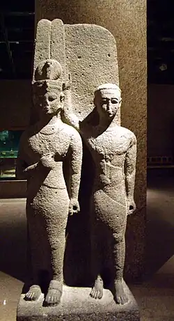 Double statue depicting a Kushite queen regnant (left) and an unknown male associate (right), attributed to Nahirqo[1]