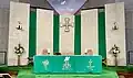 Sanctuary and communion table (decorated in Green for Ordinary Time).
