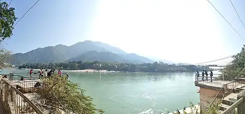 View of Rishikesh with Ganga River and Hills in Background