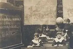 Lessons at school, in 1911. "The first Tatar school" is written on the blackboard. (Azerbaijanis were called Tatars in the beginning of the 20th century.)