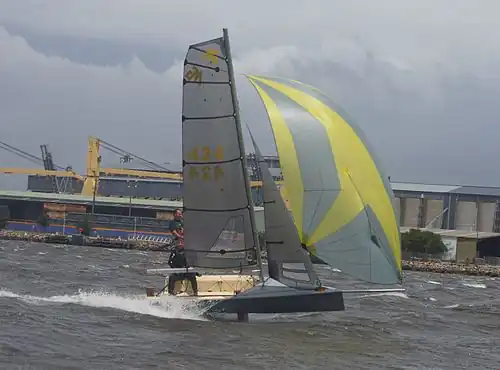 MG14 sailing downwind in heavy breeze