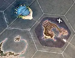 Two stickers - an island hex and a cross marker - added permanently to the game board in a game of SeaFall. Such additions are prevalent in legacy-style games.