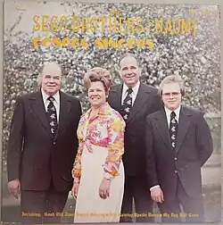 Naomi Sego (second from left) and the Sego Brothers on a 1978 album cover