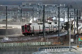 A train of electric railcars in motion