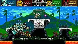 A golden knight, a black knight, a bronze warrior with a sword and shield, and a burly knight carrying a large snow shovel battle each other on one of the game's stages. A colosseum is visible in the background. The four knights are surrounded by a pit of magma.