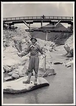 A fisherman wearing tabi with sewn-on woven-straw soles, 1915