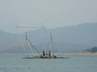The Phi Pan Nam mountains near the Sirikit Dam. The haze caused by wildfires is prevalent during the dry season