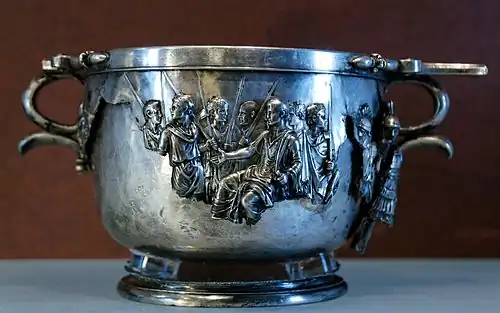 Skyphos with seated Augustus receiving vanquished barbarians