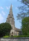 St James's Church, Tunbridge Wells, 1860–62 by Ewan Christian, the windows have rich Geometrical tracery and the south-west steeple also serves as an entrance porch[163]