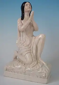 Girl at prayer, circa 1860.