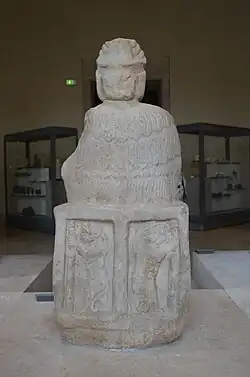 The lions on the back of the throne