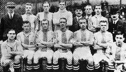 A black and white team photo of Stockport County