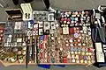 Replica and fake Nazi and Communist awards and other vintage collectibles for sale at a street market in central Sofia, Bulgaria in 2024.