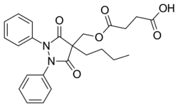 Two-dimensional monochrome diagram showing the structure of the molecule of Suxibuzone, uing the hexagonal style to depict a chemical compound.