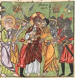 Betrayal of Jesus by Judas.