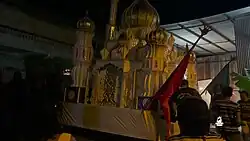 Tadjah being moved out of the building it was built in