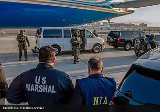 United States Marshals Service with NIA officials during the extradition of Tahawwur in USA.