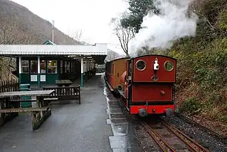 A train in Abergynolwyn station, looking east, 29 December 2009 The newest station, with its western extension, is visible on the left.