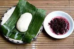 Tapai ketan (right) served with uli (glutinous rice cooked with grated coconut, and mashed; left)