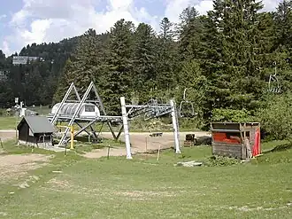 Fixed-grip chairlift, with Delta terminal built in 1986 in Le Lioran, France.