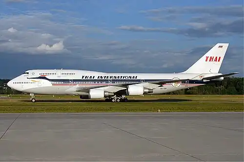Boeing 747-4D7 (HS-TGP) in the retro livery