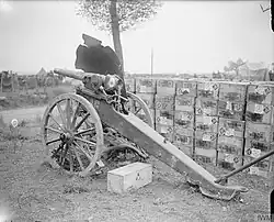A captured German 5.7&nbsp;cm Maxim-Nordenfelt gun with destroyed shield. Meaulte-Albert Road after the Battle of the Somme.