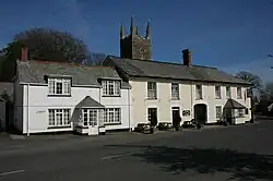 A roadside photograph of the two-storey building that houses the pub