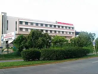 Hospital Dr. Pila (now, Hospital Metropolitano Dr. Pila) on the north side of Avenida Las Américas (PR-163) looking northeast, in Barrio Canas Urbano
