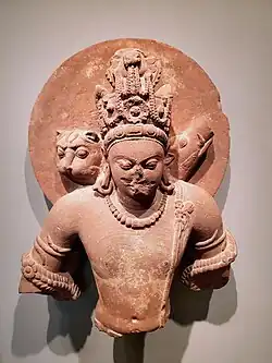 Vishnu in three incarnations (Chaturvyuha): Vishnu himself or Vāsudeva-Krishna in human form, Varaha as a boar, Narasimha as a lion. Mathura, mid-5th century CE. Boston Museum.[45]