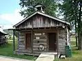 The John Prater Cabin is a log school house