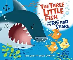 The book cover contains the title "Three Little Fish and the Big Bad Shark" and an illustration of a shark baring the shark's teeth at the three little fish.
