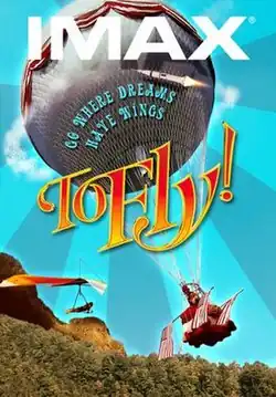 A hot-air balloon, hang-glider, and rocket above a forested rocky terrain. The tagline is "Go where dreams have wings."