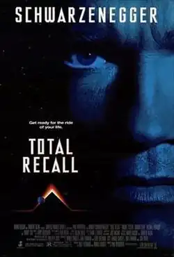 The film poster shows a close up of Arnold Schwarzenegger, with his last name on top and a pyramid shape glowing on top with planets near the bottom. The tagline read "Get ready for the ride of your life". Below the tagline is the film's name and the bottom contains a list of the film's credits.