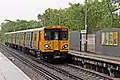 A Class 507 arrives with a service to Liverpool Central.