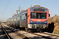 CP's 2240 Series are responsible for Urban (Lisbon's Sado Line and the Coimbra to Figueira da Foz urban service), Regional and Inter-Regional services. Unit 2295 is here seen with a now outdated red color scheme, on the Linha do Norte, near Entroncamento.