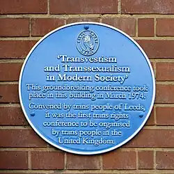 Image of a blue plaque place in 2024 to commemorate the 50th anniversary of the conference, on Leeds University Union.