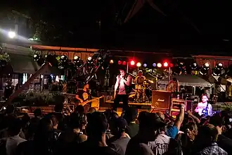 Trapt performing live in 2013. From left to right: Charell, Brown, Howard and Miguel (on the far right)