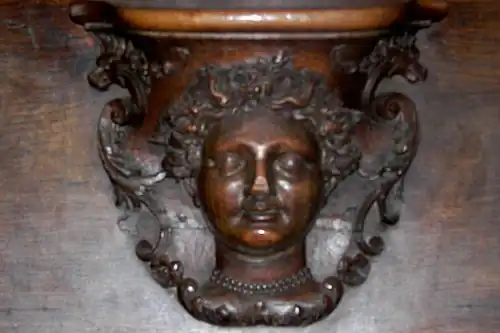 Carved figure of divine mercy, originally from Clairvaux Abbey, on a choir stall